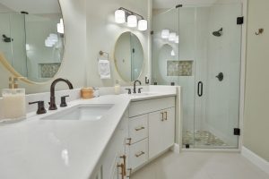 Quartz vanity top with bronze faucets, Bethesda bathroom remodel