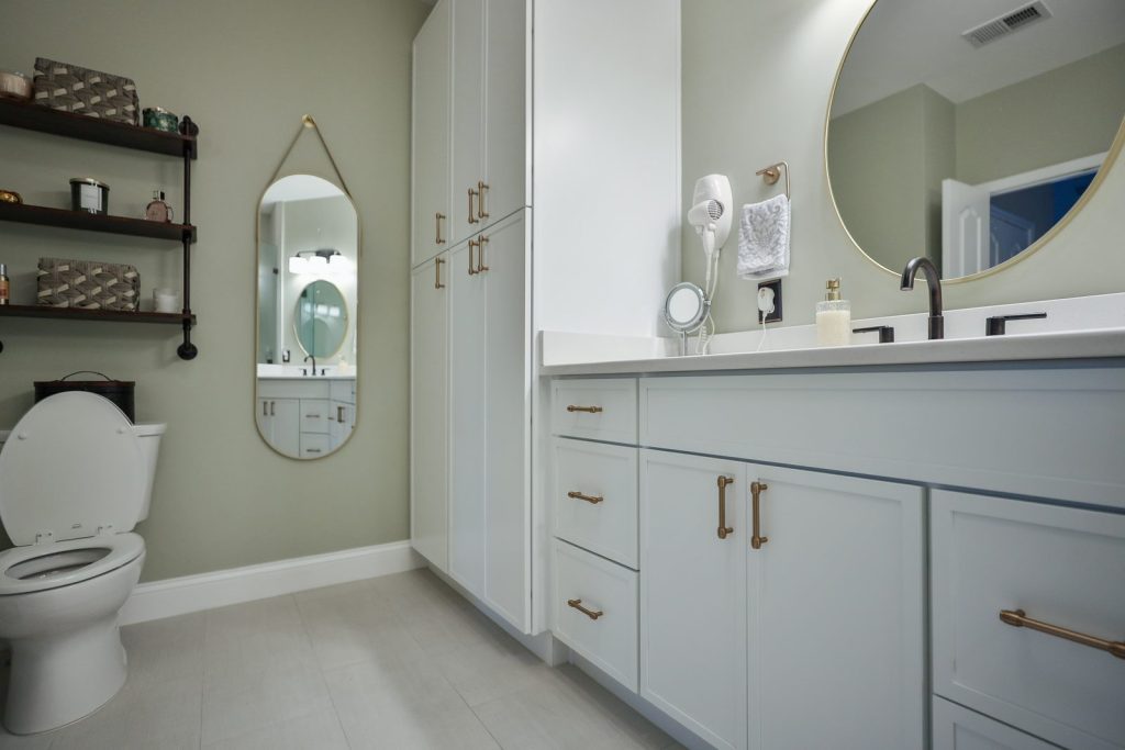 After — The corner tub gave way to full-height storage.