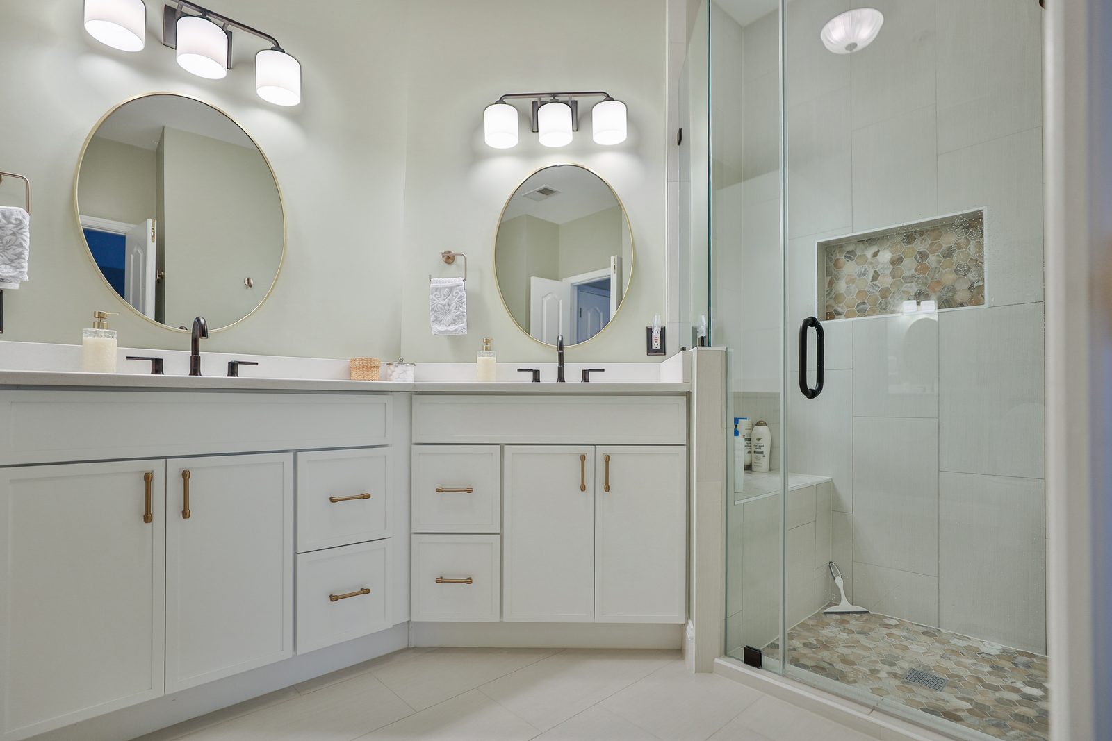 Bathroom remodel with a double vanity and frameless glass shower, Bethesda MD