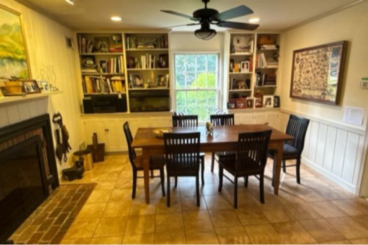 Before — The dining room and fireplace wall.
