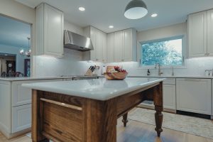 Custom wood island with a white quartz top, Bethesda kitchen remodel