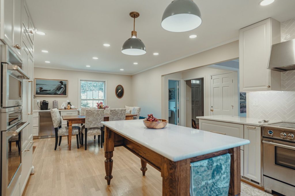 Remodeled Bethesda kitchen with a custom wood island and painted cabinetry