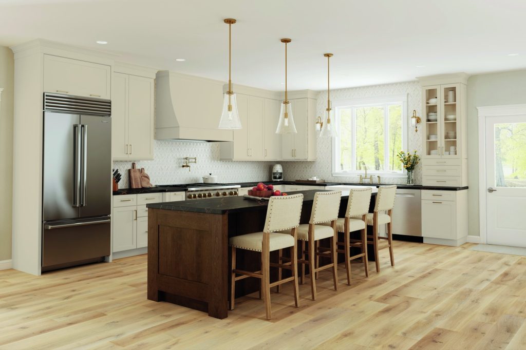 KraftMaid Vantage Bowen kitchen with a cream perimeter and dark wood island