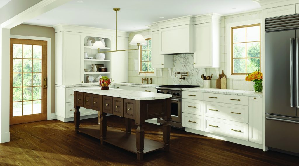 KraftMaid Vantage Jovana white kitchen with a dark wood island